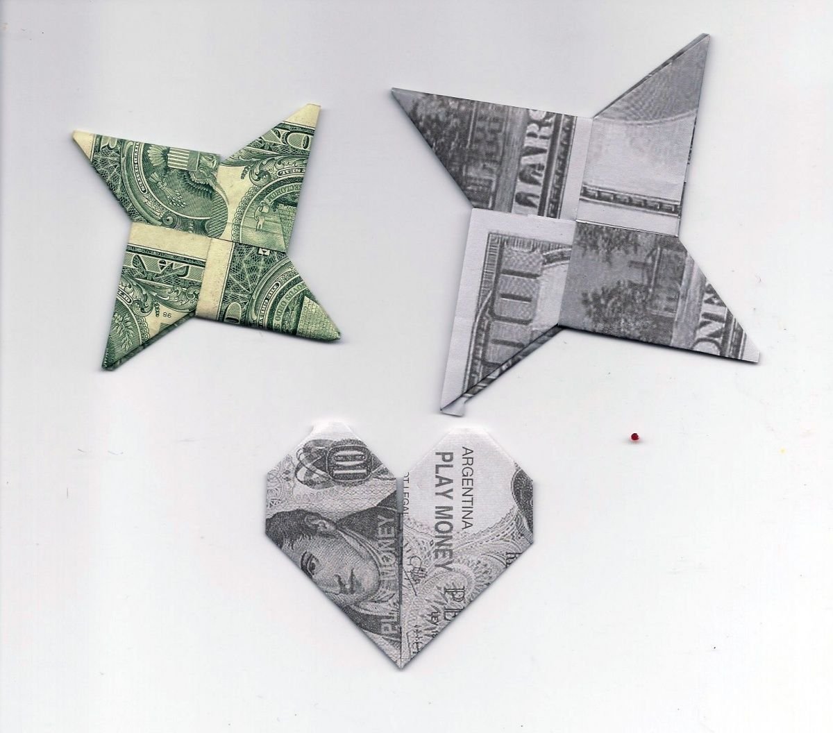 Треугольник из купюры. Оригами из купюры. Сложить деньги. Оригами из денежных купюр. Звезда из денежных купюр.